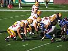 220px-Redskins_vs_Giants_line_of_scrimmage_throwbacks.jpg