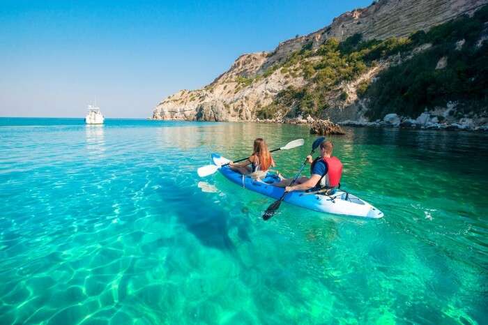 A couple boating in Naxos in Greece
