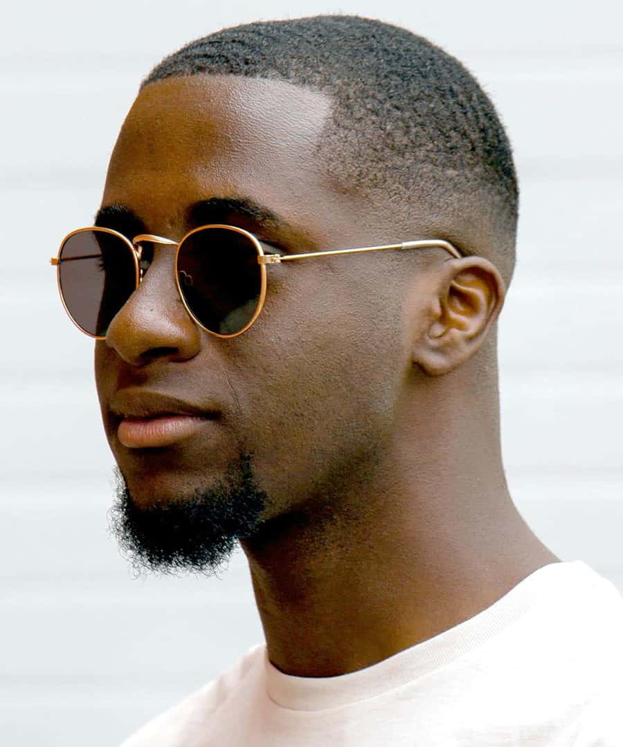 Black man with a faded buzz cut