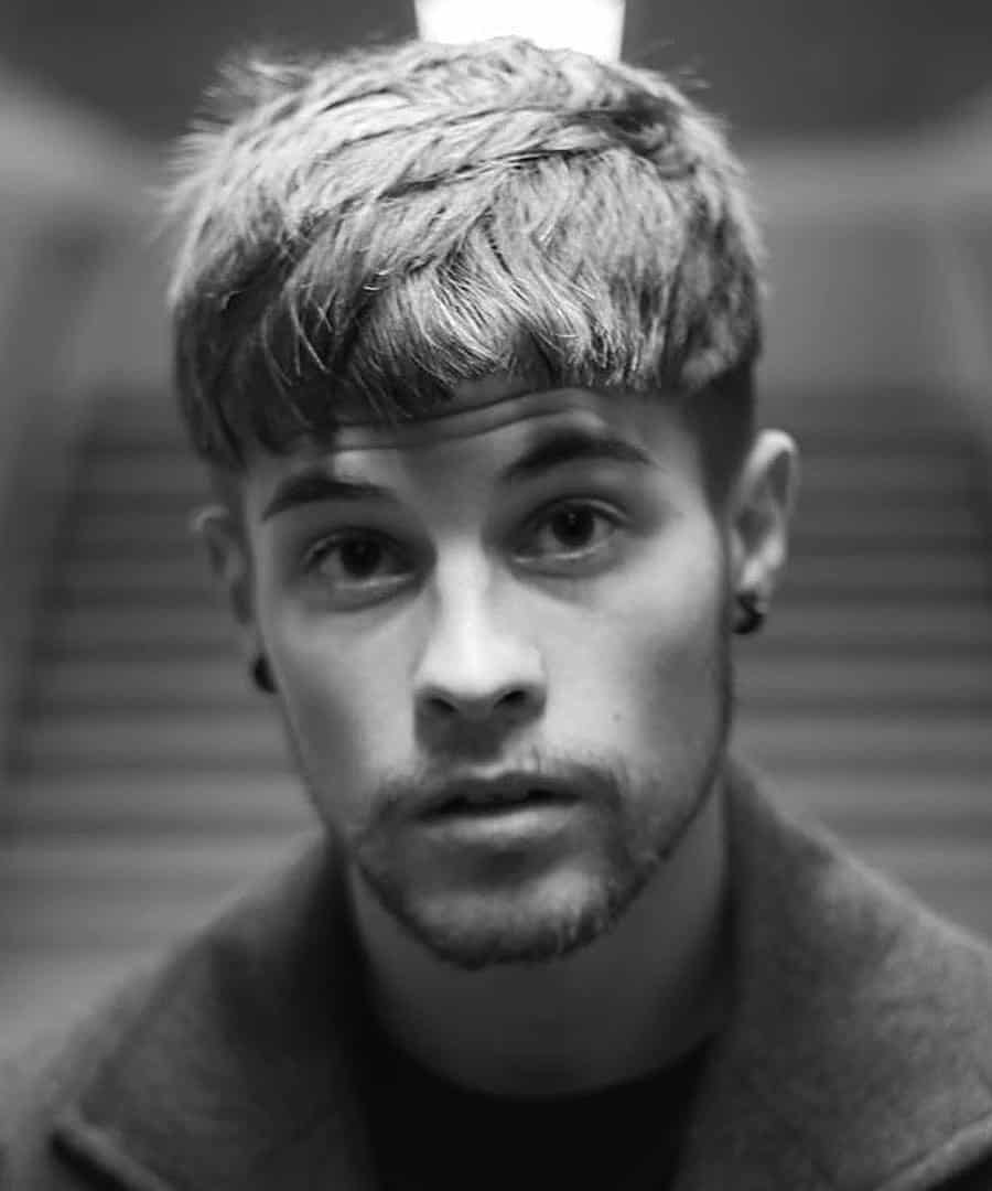 Modern men's messy bowl haircut