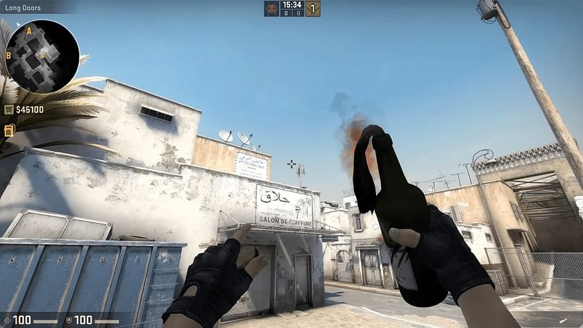 Pop a Molotov or frag over the Salon to clear New Car on Dust 2 in CS: GO (Image via Valve)
