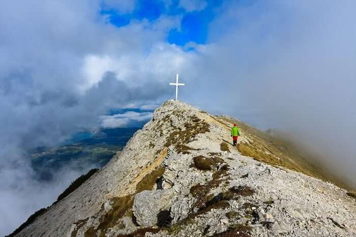View through the clouds from the top of the Kepa mountain in Karavanke range on the border of Slovenia and Austria